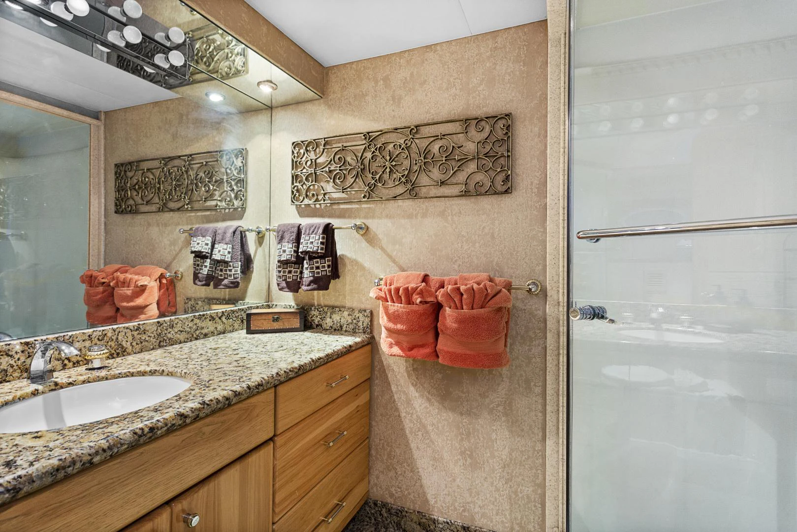 a bathroom with a large mirror aboard ISABELLA Yacht for Sale
