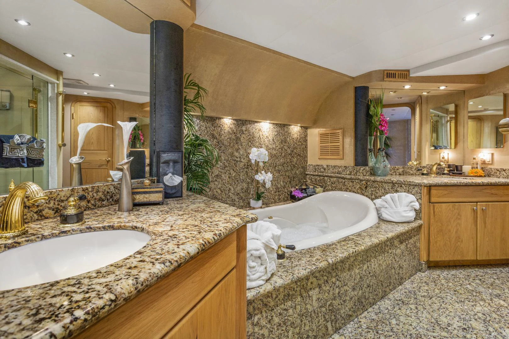 a bathroom with marble counter tops aboard ISABELLA Yacht for Sale