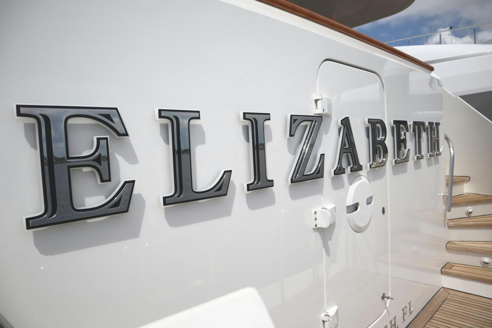 a white building with black text aboard ELIZABETH Yacht for Sale