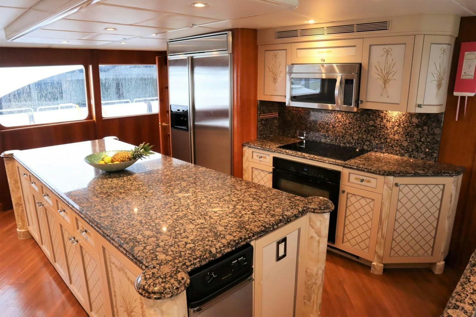 a kitchen with marble counter tops aboard ELIZABETH Yacht for Sale
