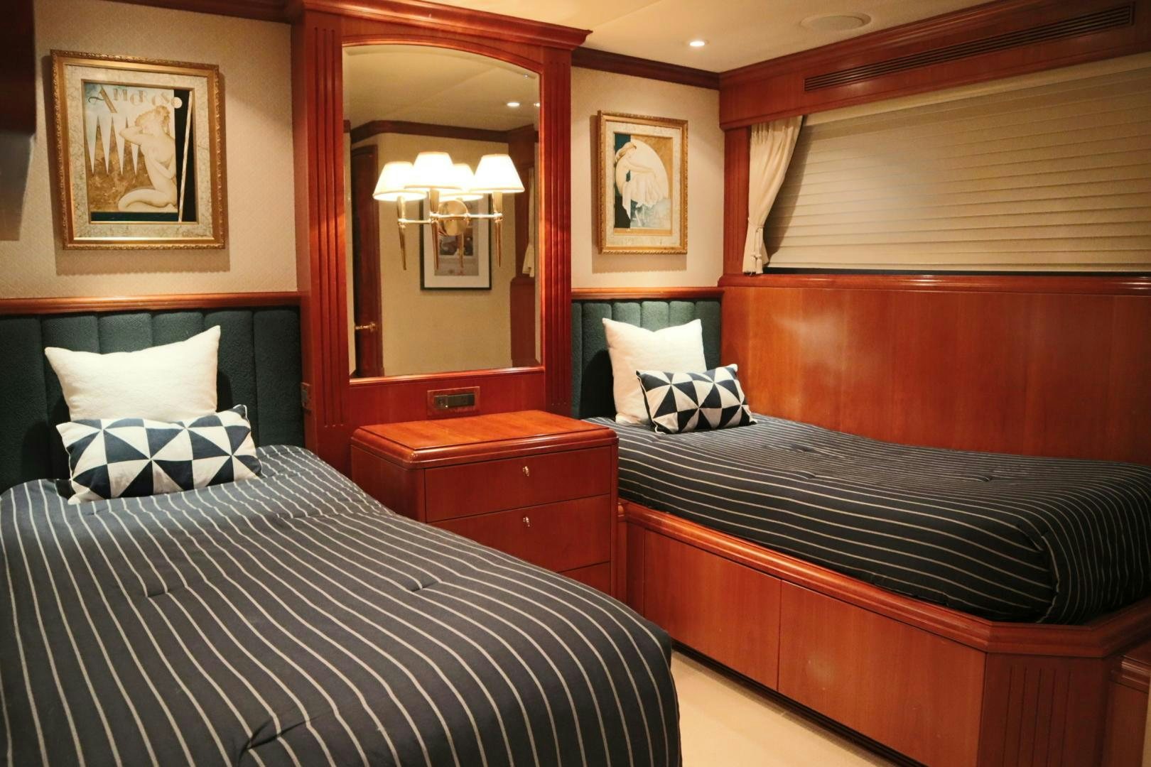 a room with a bed and a mirror aboard ELIZABETH Yacht for Sale