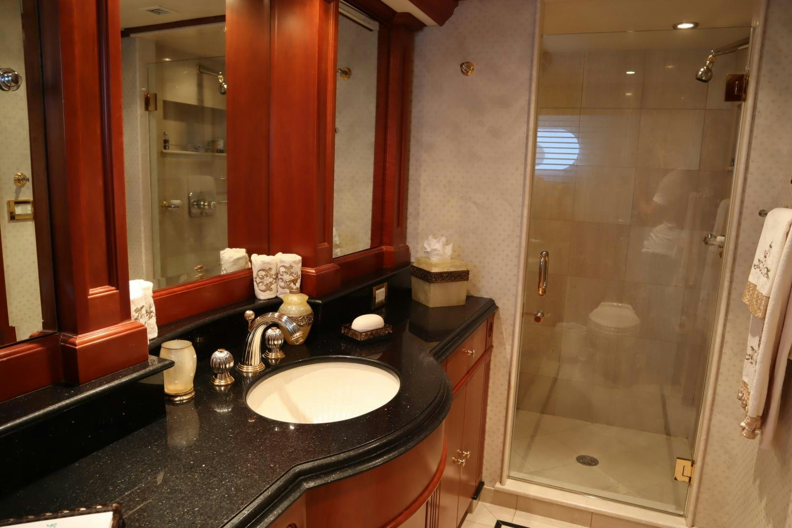 a bathroom with a sink and a shower aboard ELIZABETH Yacht for Sale