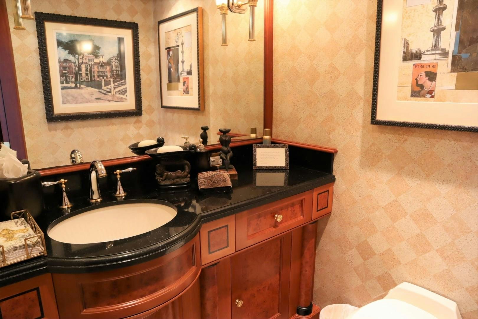a bathroom with a sink and a mirror aboard ELIZABETH Yacht for Sale