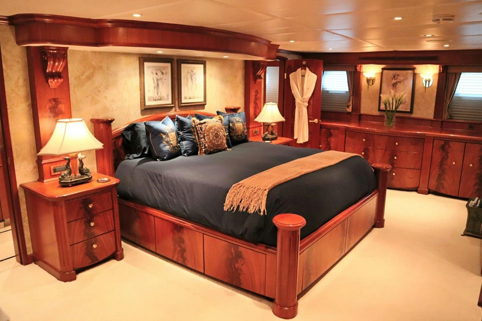 a large bed in a room aboard ELIZABETH Yacht for Sale