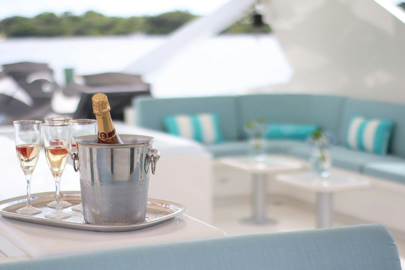 a glass of beer on a table aboard ELIZABETH Yacht for Sale