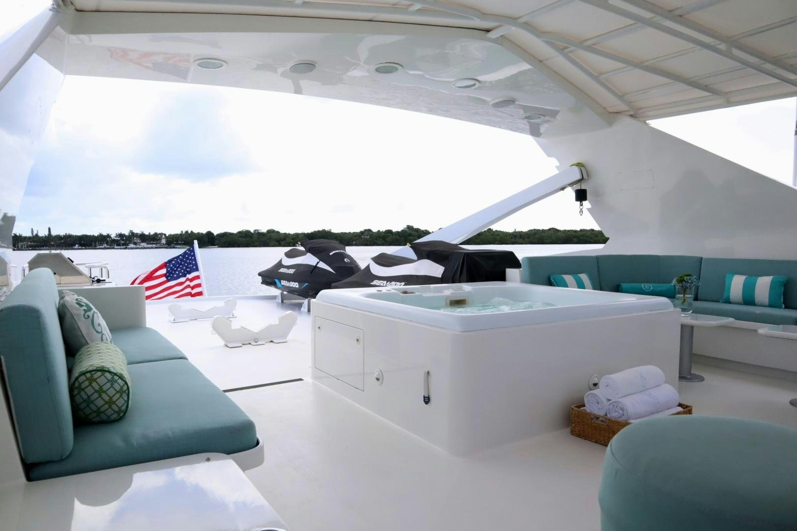 a room with a large window and a bed and a flag aboard ELIZABETH Yacht for Sale