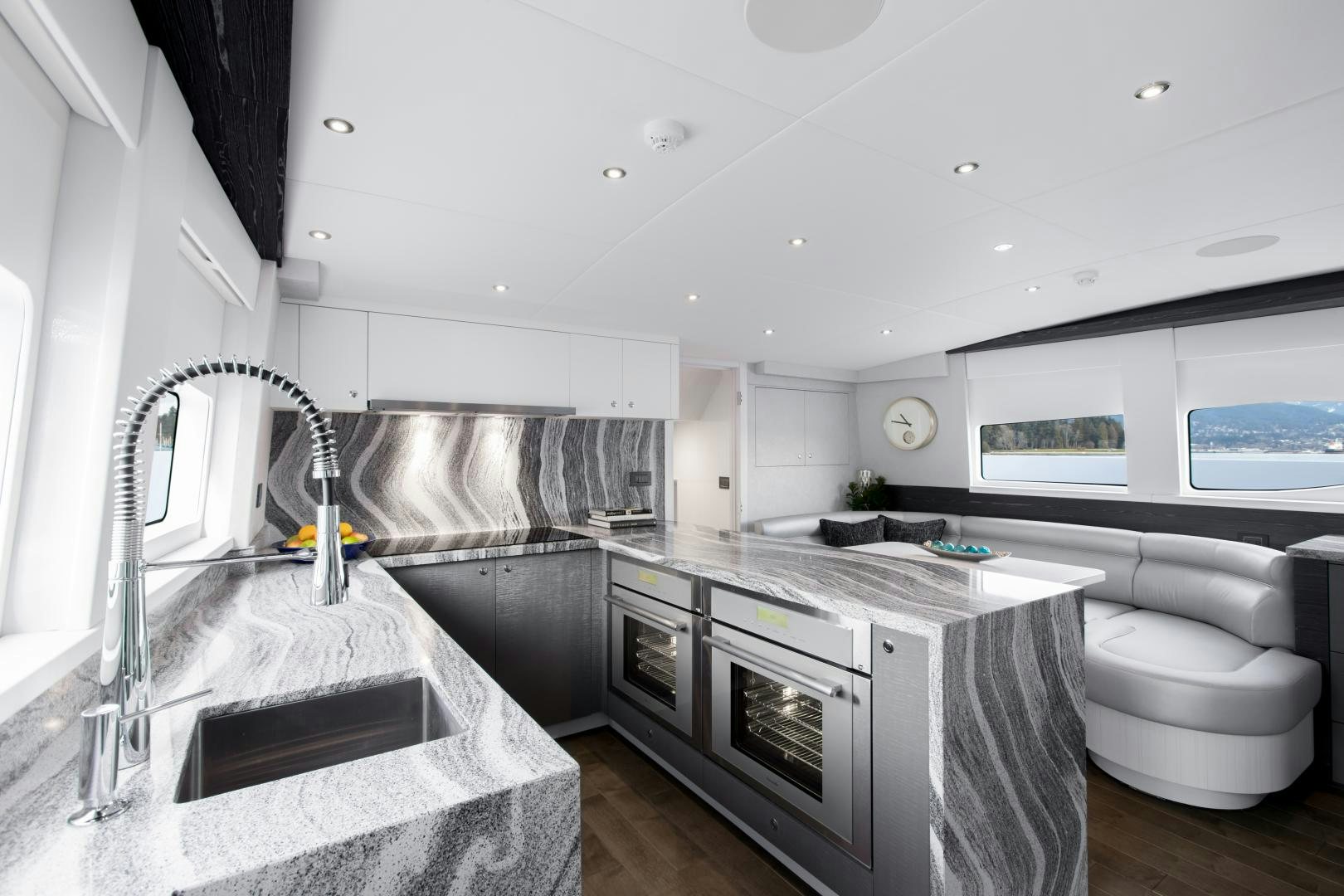 a kitchen with a large sink aboard CRESCENT 117 Yacht for Sale