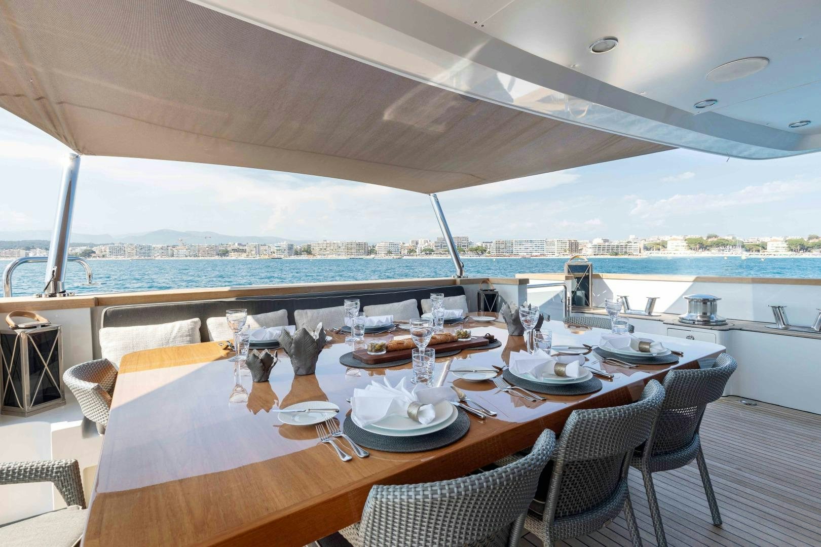 a table set for a meal aboard TOMMY BELLE Yacht for Sale