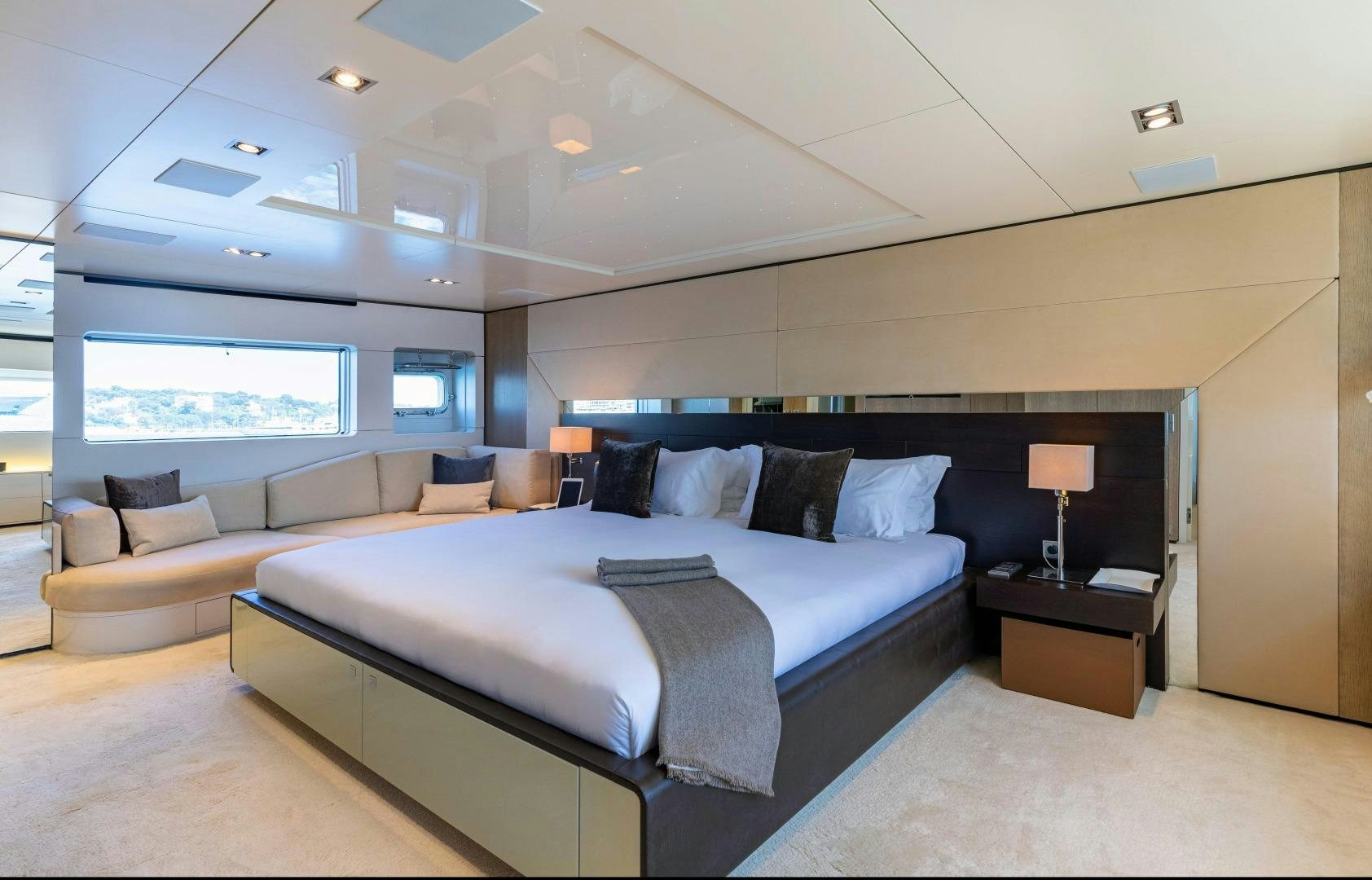 a large bed in a room aboard TOMMY BELLE Yacht for Sale