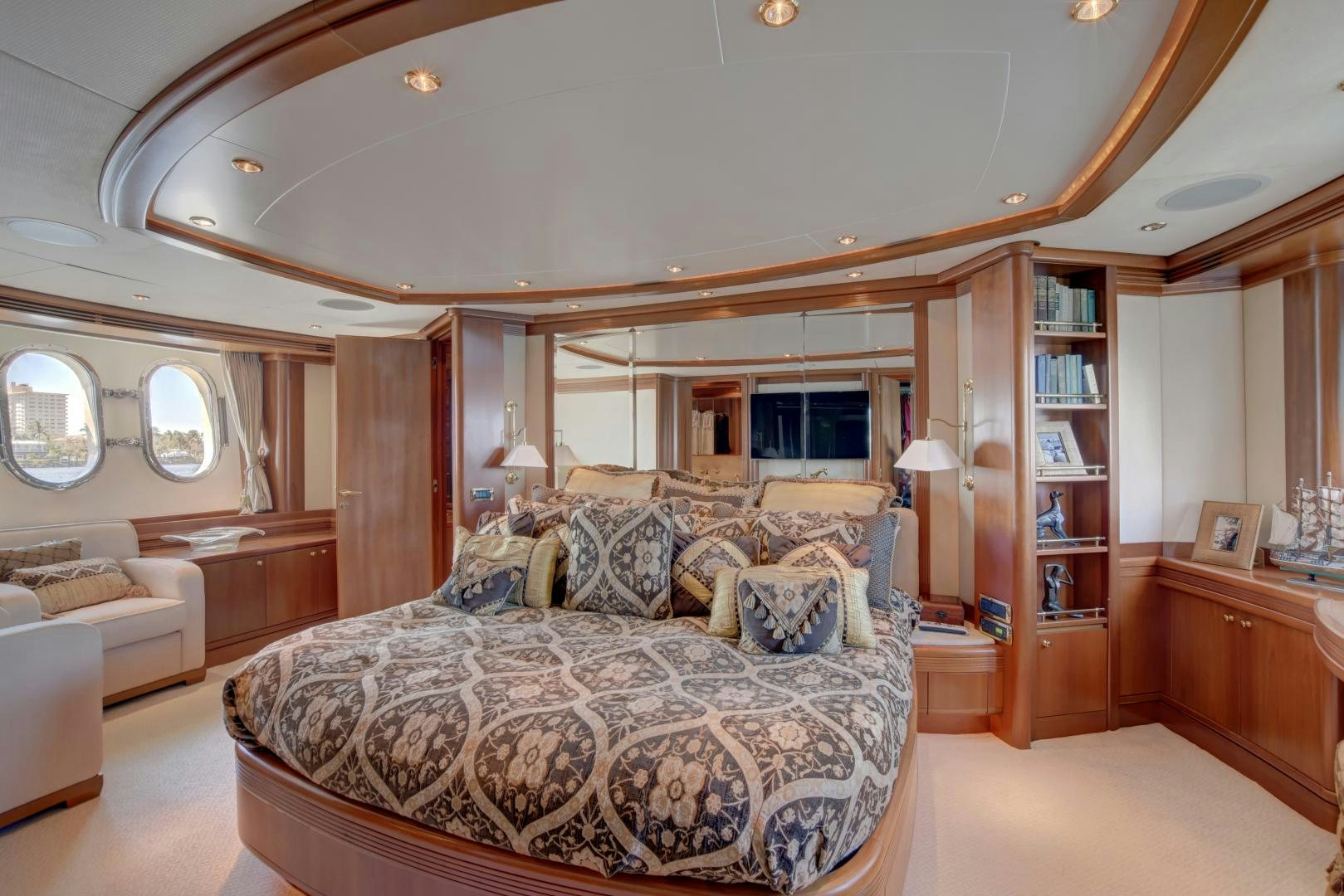 a large bedroom with a large bed aboard SIN OR SWIM Yacht for Sale