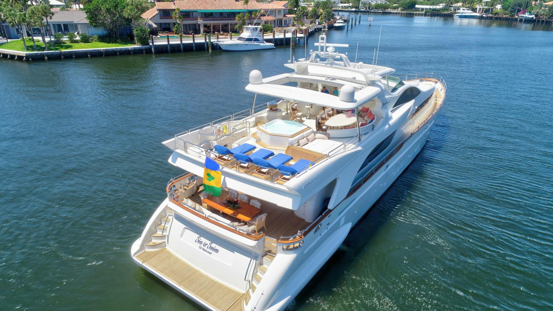 a boat on the water aboard SIN OR SWIM Yacht for Sale