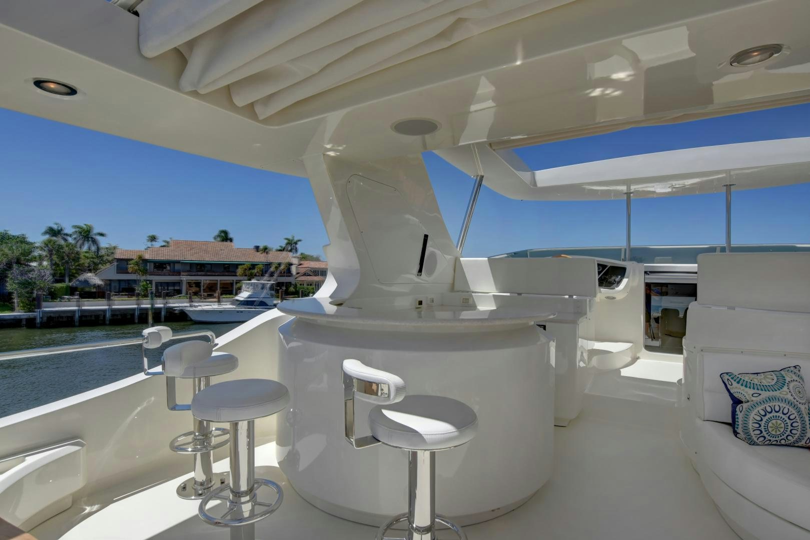 a white machine with stools aboard SIN OR SWIM Yacht for Sale