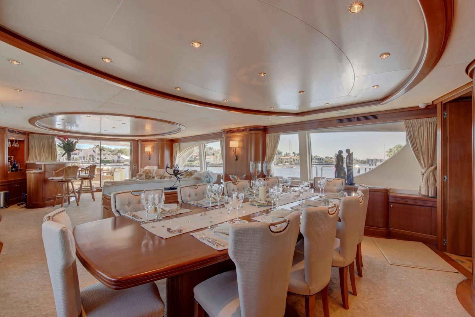 a dining room with a table and chairs aboard SIN OR SWIM Yacht for Sale