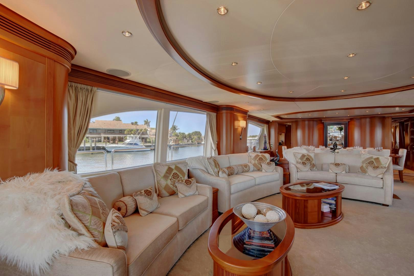 a living room with a large window aboard SIN OR SWIM Yacht for Sale