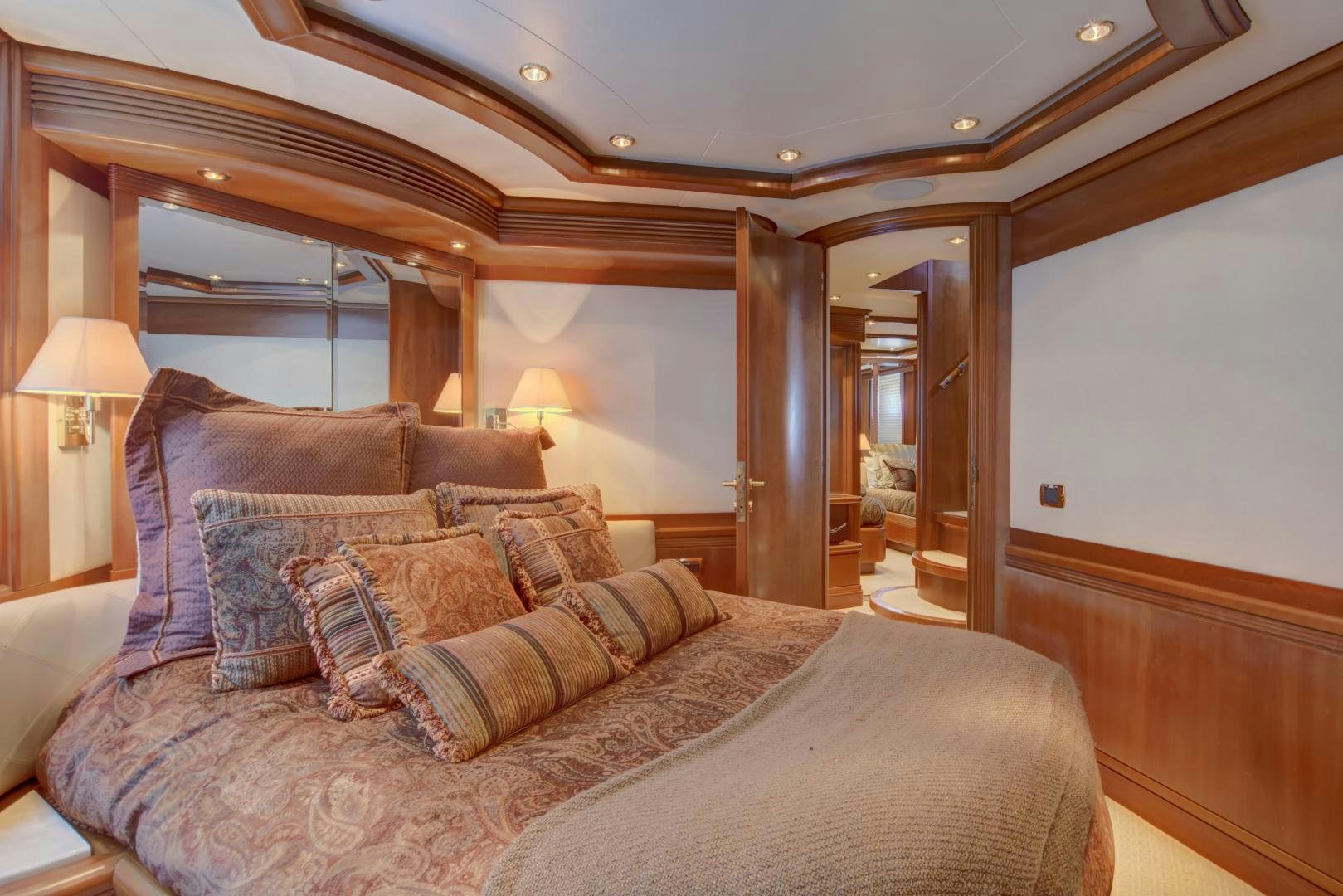 a large bed in a room aboard SIN OR SWIM Yacht for Sale