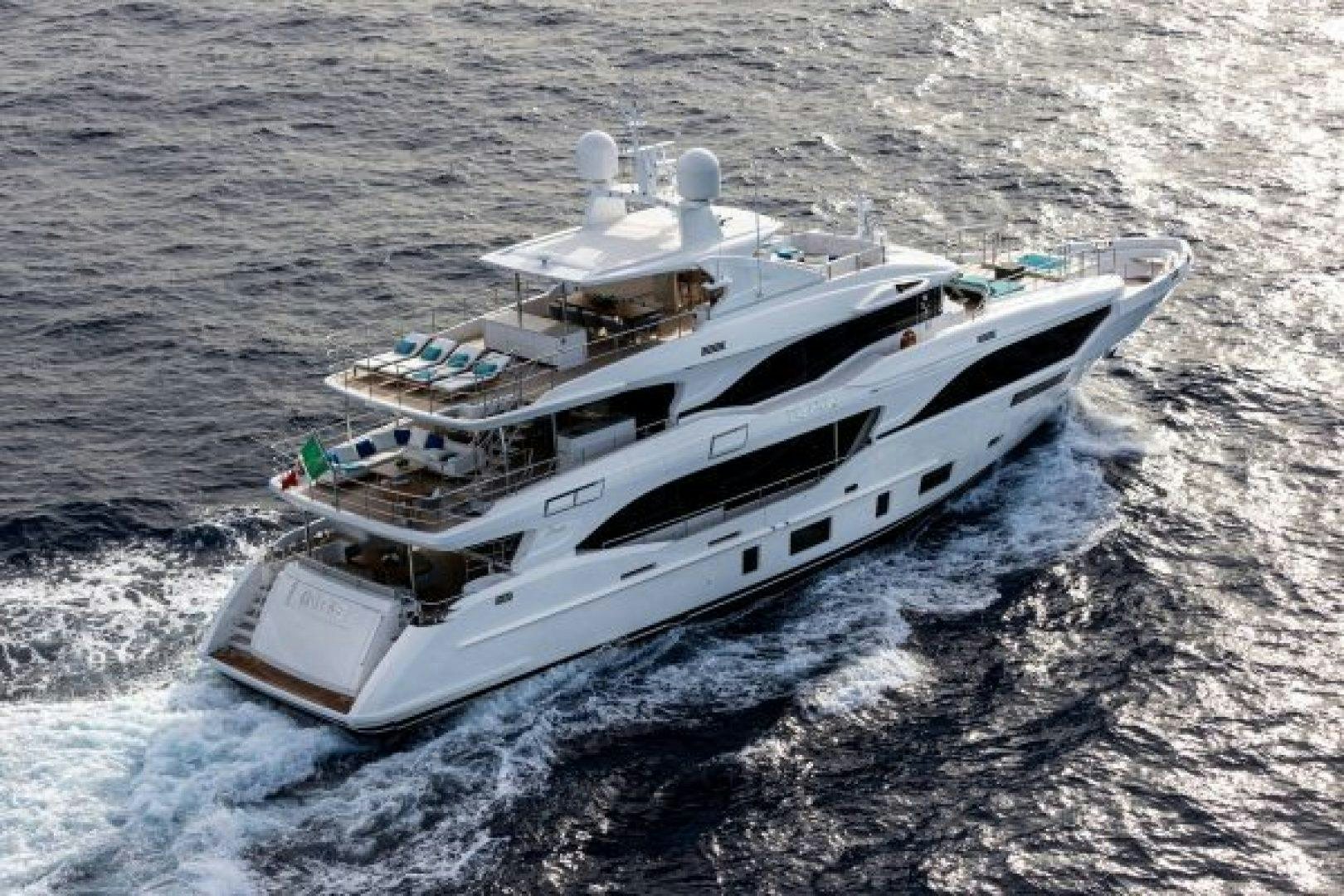 a white boat on the water aboard BENETTI MEDITERRANEO 116  Yacht for Sale