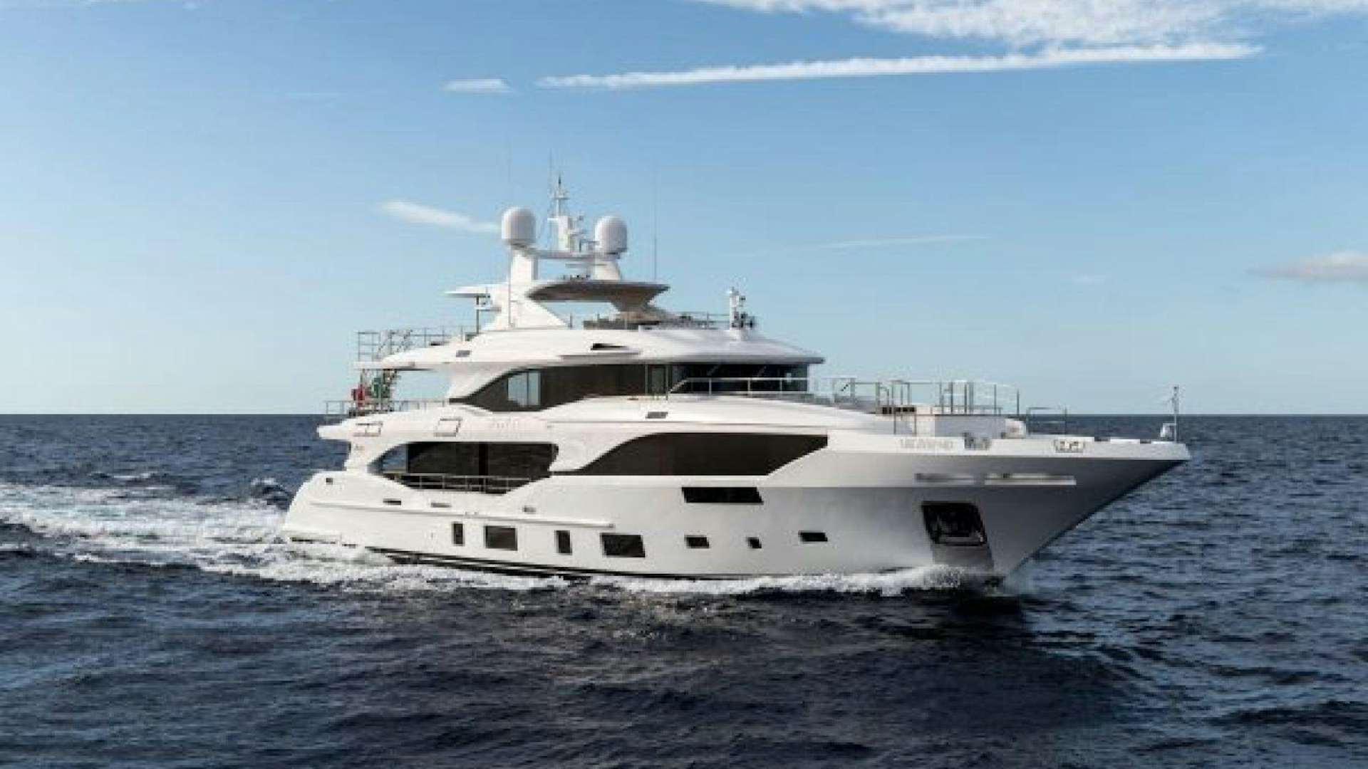 a white boat in the water aboard Benetti Mediterraneo 116  Yacht for Sale