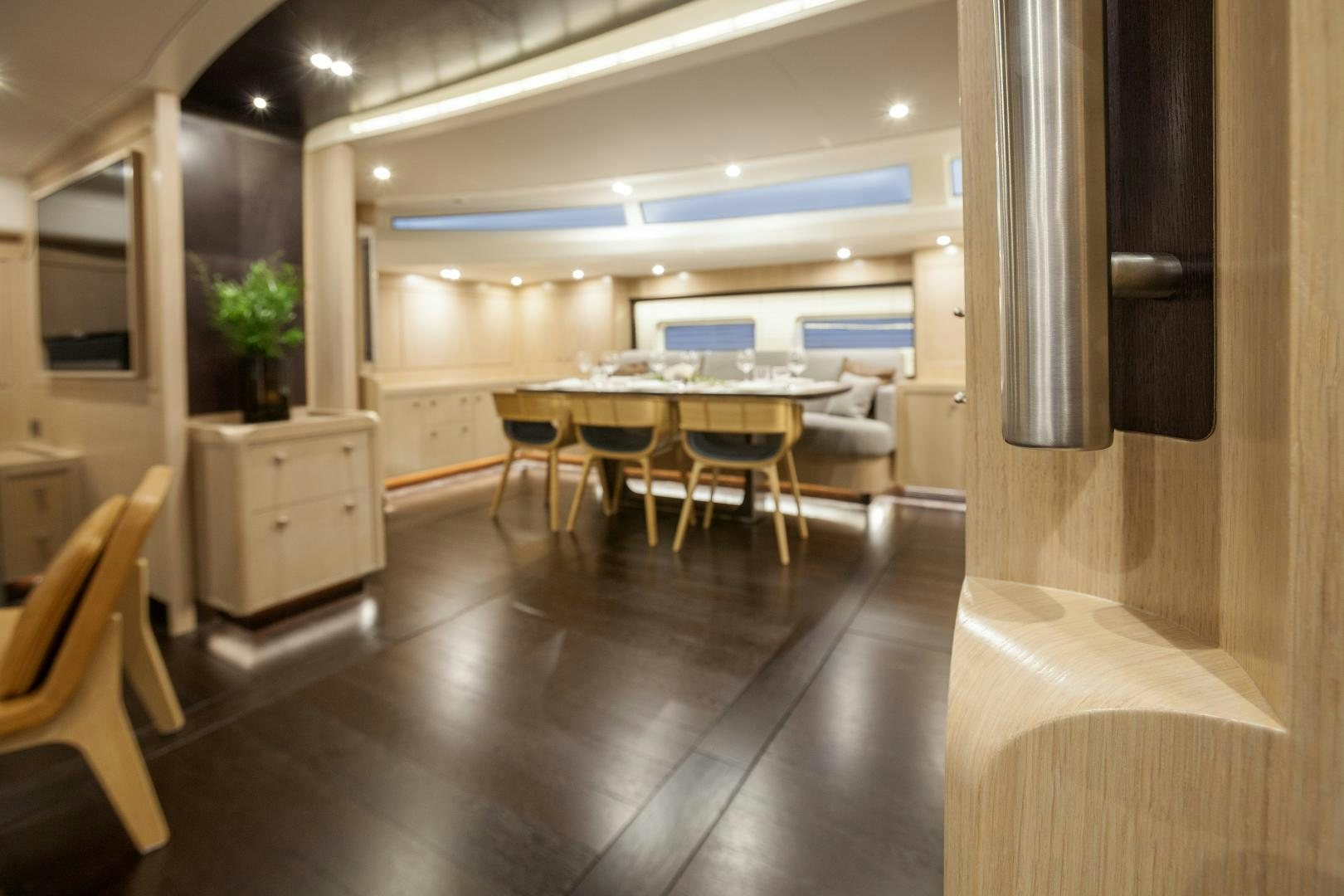 a room with a table and chairs aboard ODIN  Yacht for Sale