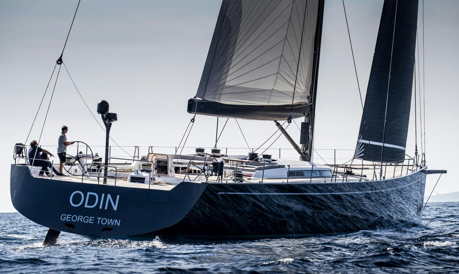 a boat with a group of people on it aboard ODIN  Yacht for Sale