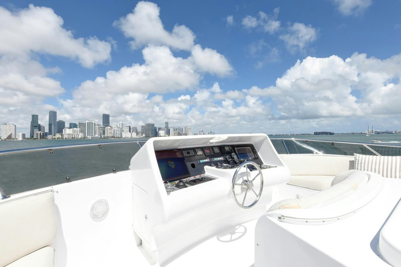 a white car on a road aboard PARADIGM Yacht for Sale
