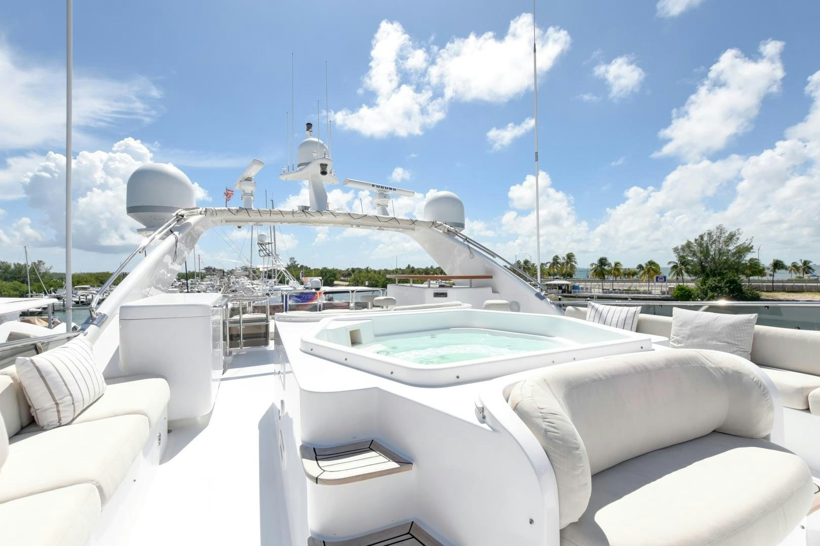 a large white boat with a white sail on it aboard PARADIGM Yacht for Sale