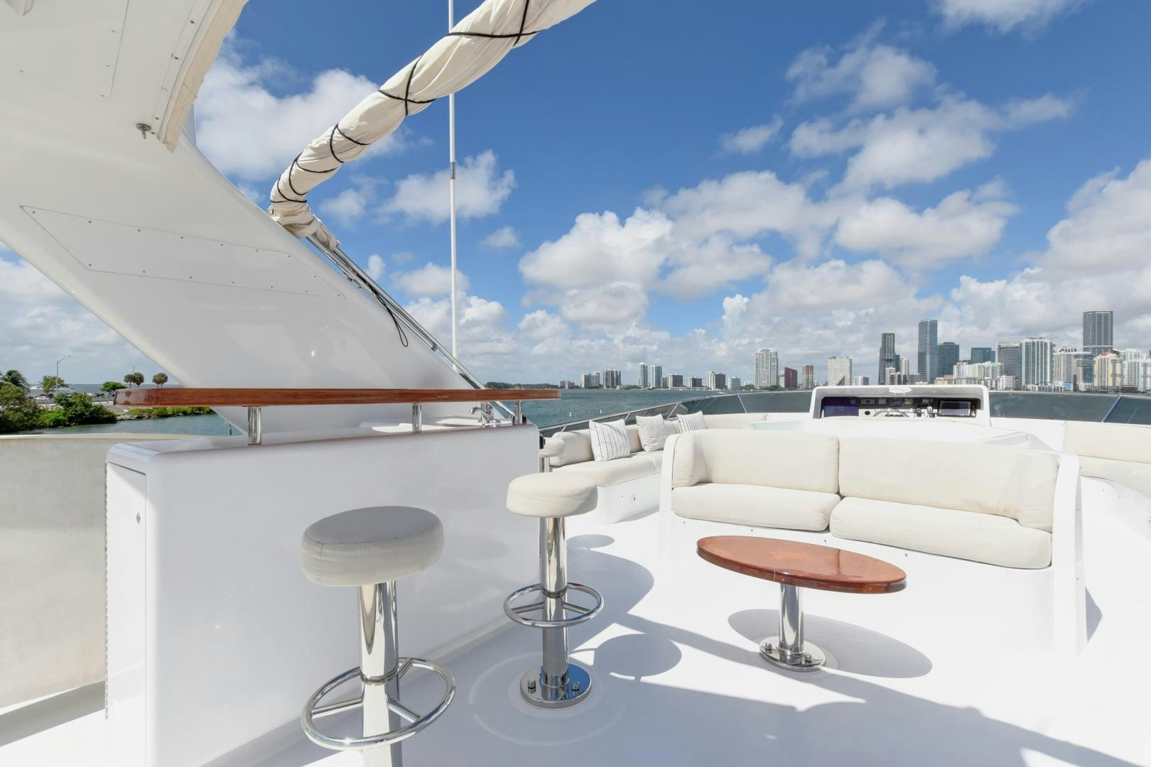 a room with a table and chairs aboard PARADIGM Yacht for Sale