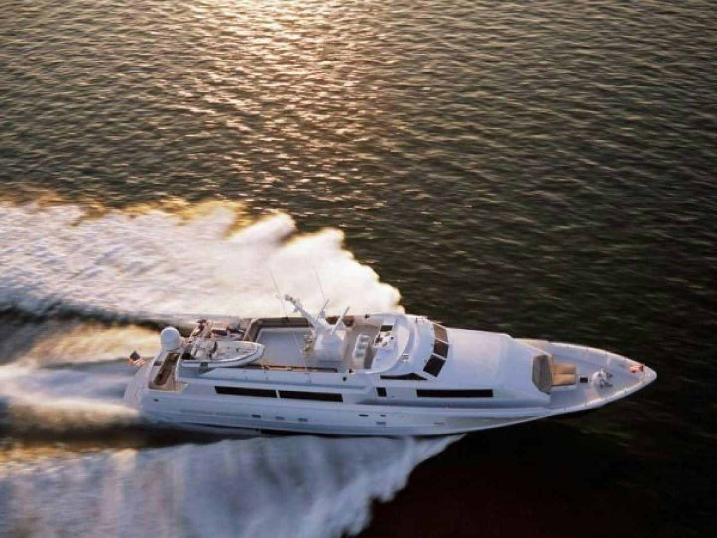 a white boat on water aboard THUNDERBALL Yacht for Sale