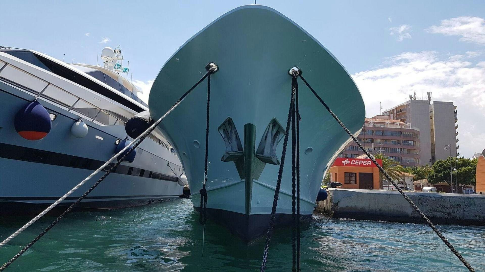 a couple of boats in the water aboard THUNDERBALL Yacht for Sale
