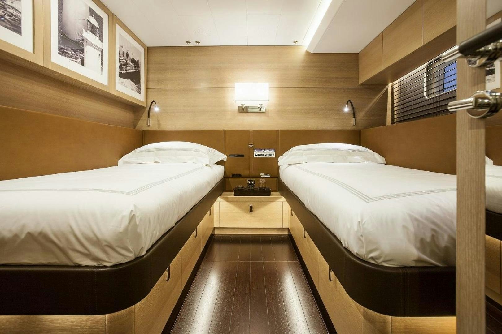 a couple of beds in a room aboard DARLIN Yacht for Charter