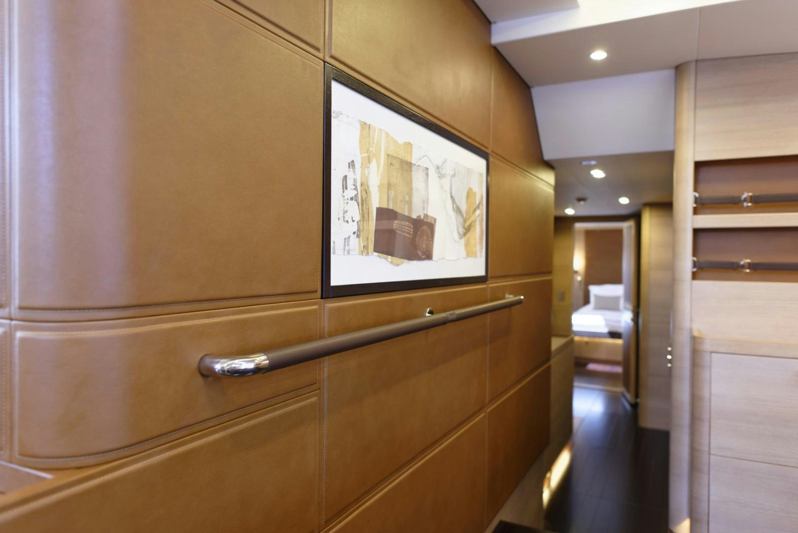 a room with a mirror and cabinets aboard DARLIN Yacht for Charter