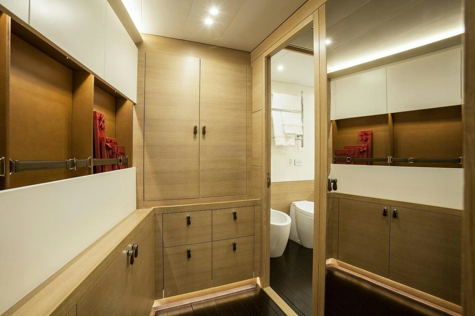 a bathroom with a glass shower aboard DARLIN Yacht for Sale