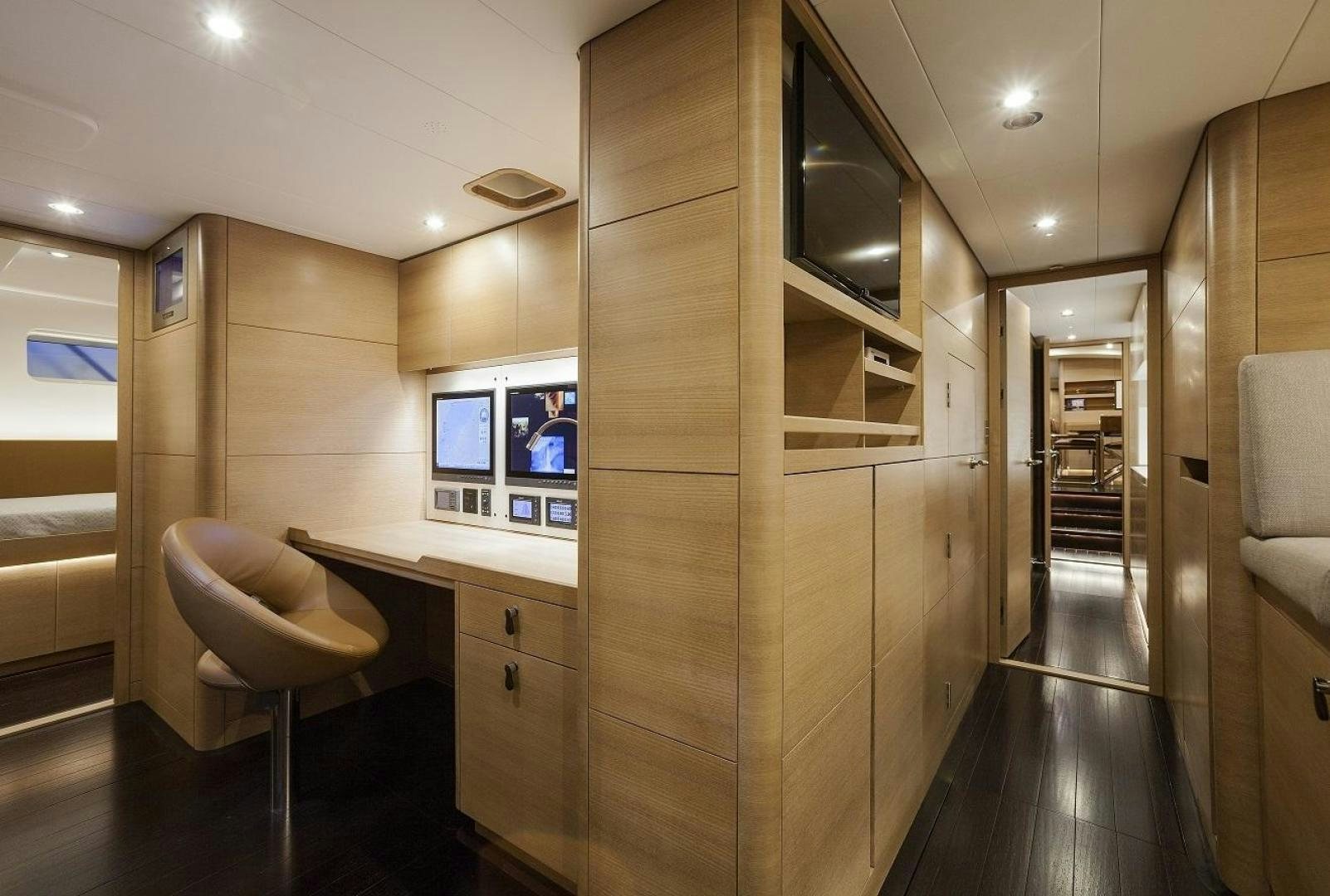a room with a desk and a chair aboard DARLIN Yacht for Sale