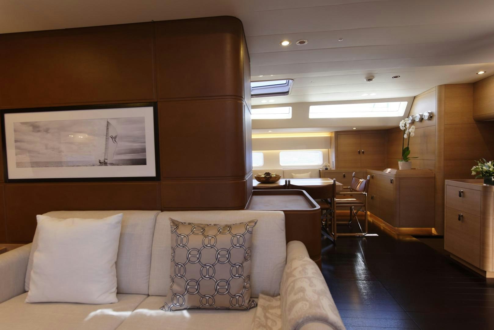 a living room with a couch and a tv aboard DARLIN Yacht for Charter