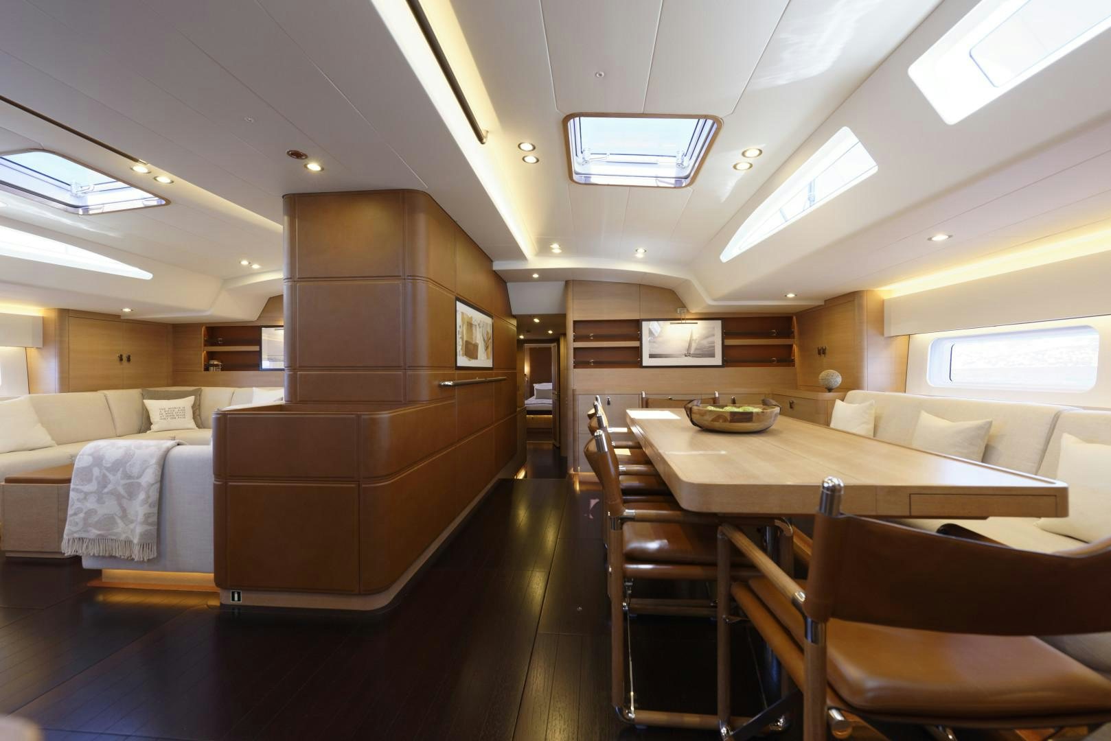 a room with a table and chairs aboard DARLIN Yacht for Sale