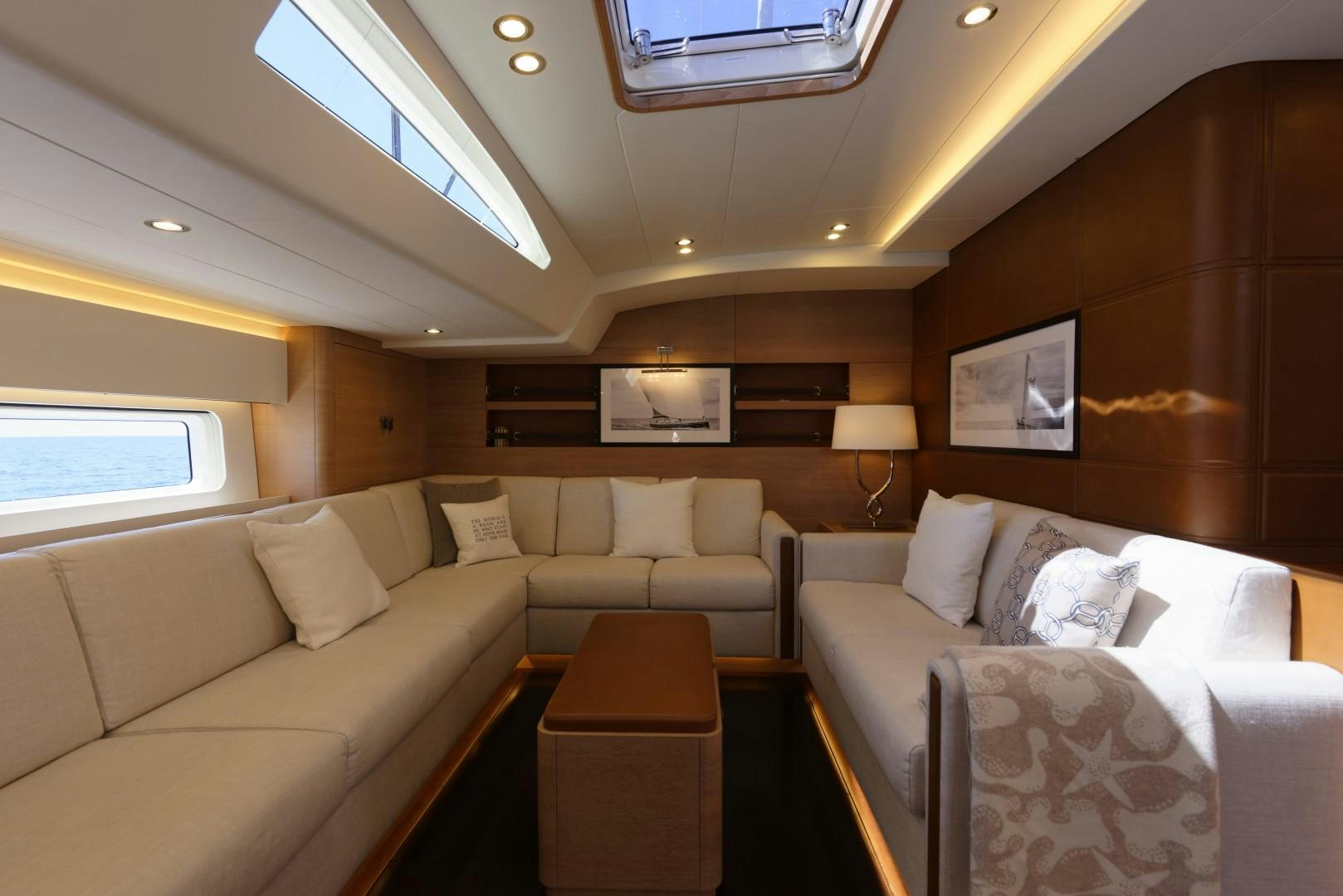 a living room with a couch and a table aboard DARLIN Yacht for Charter
