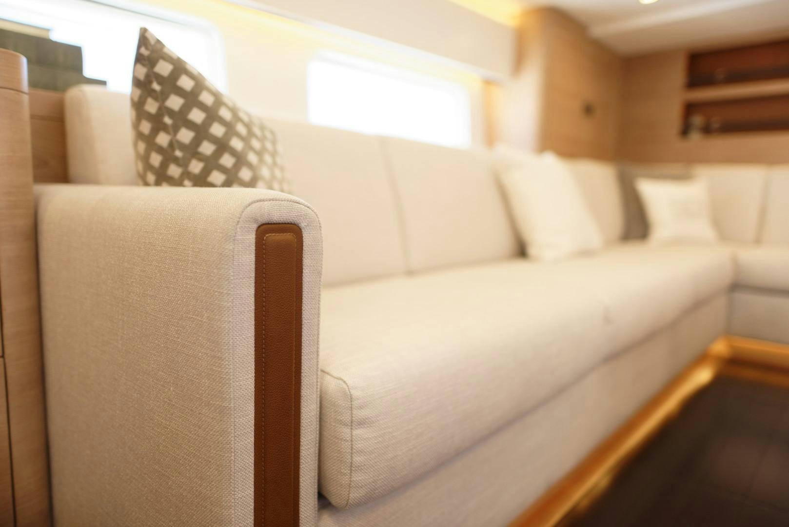 a couch with a chair aboard DARLIN Yacht for Charter