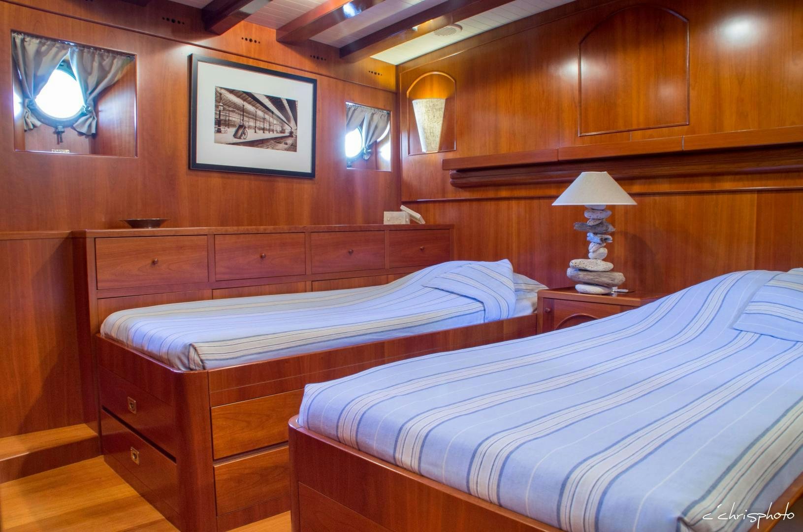a couple of beds in a room aboard OVER THE RAINBOW OF LONDON Yacht for Sale