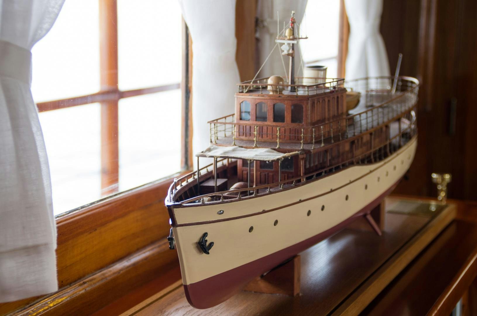 a wooden model ship aboard OVER THE RAINBOW OF LONDON Yacht for Sale