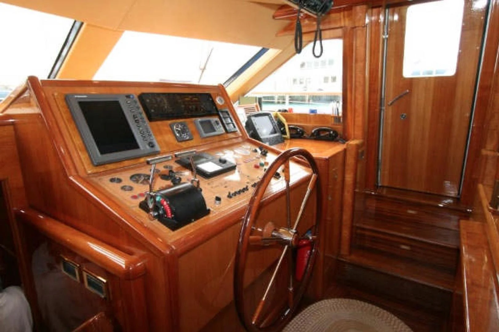 a wooden cabin with a laptop and other electronics on it aboard QUEEN SOUTH III Yacht for Sale