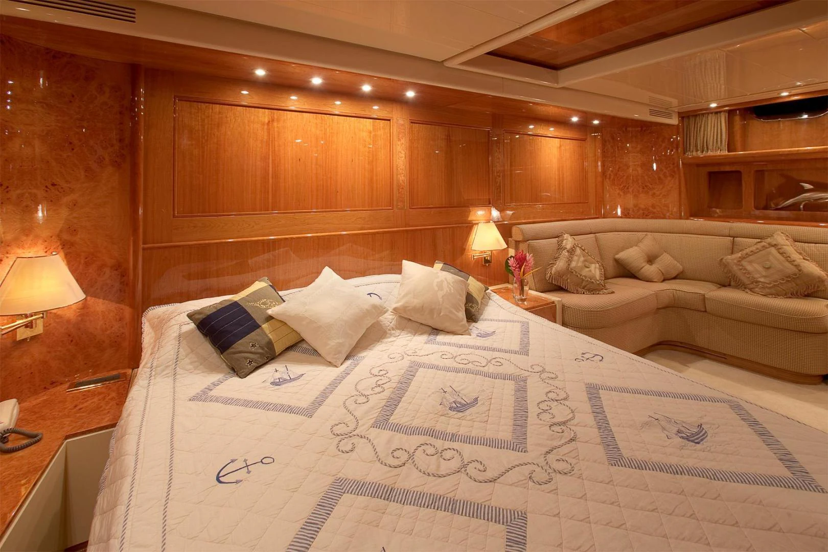 a large bed in a room aboard QUEEN SOUTH III Yacht for Sale