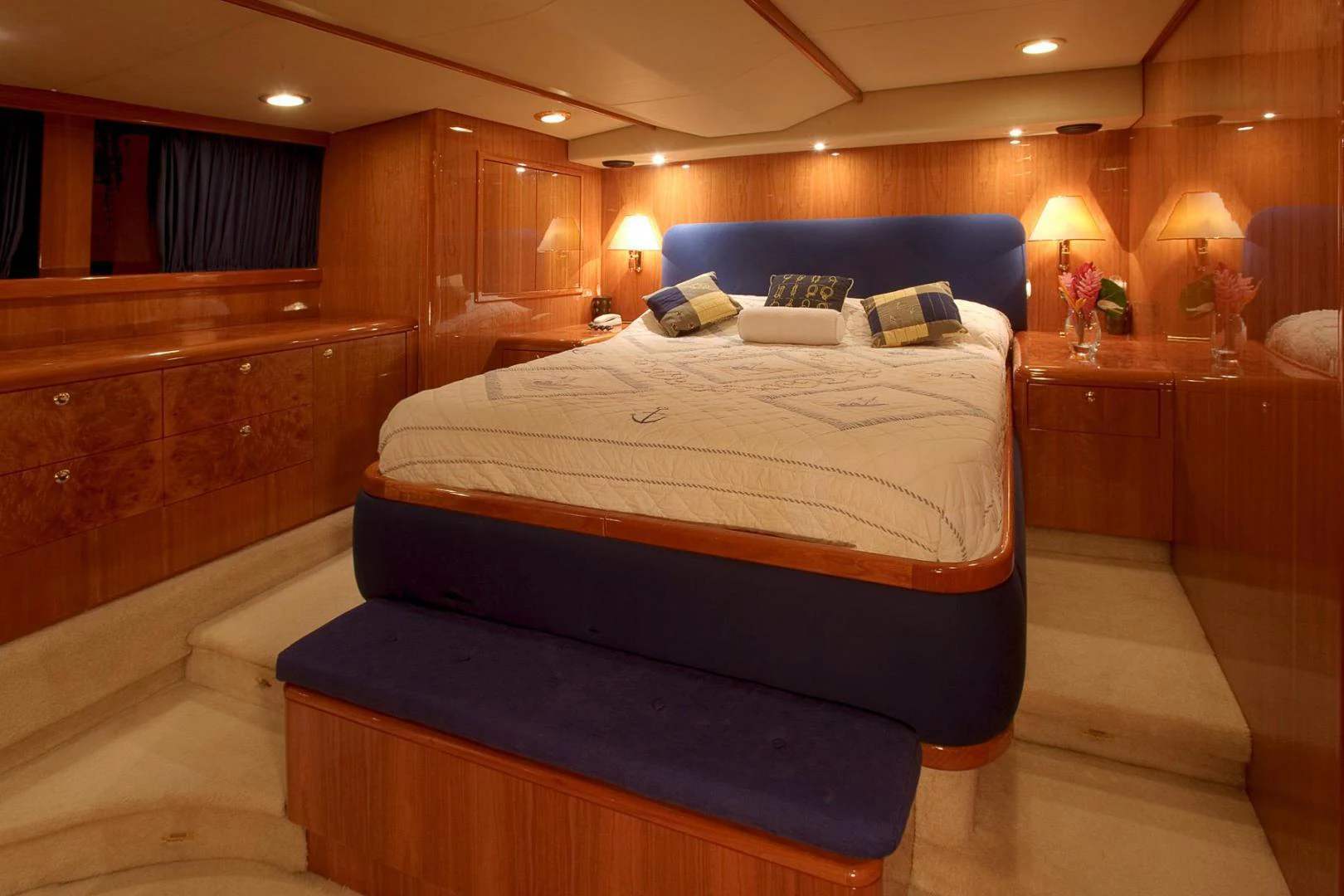 a bed in a room aboard QUEEN SOUTH III Yacht for Sale