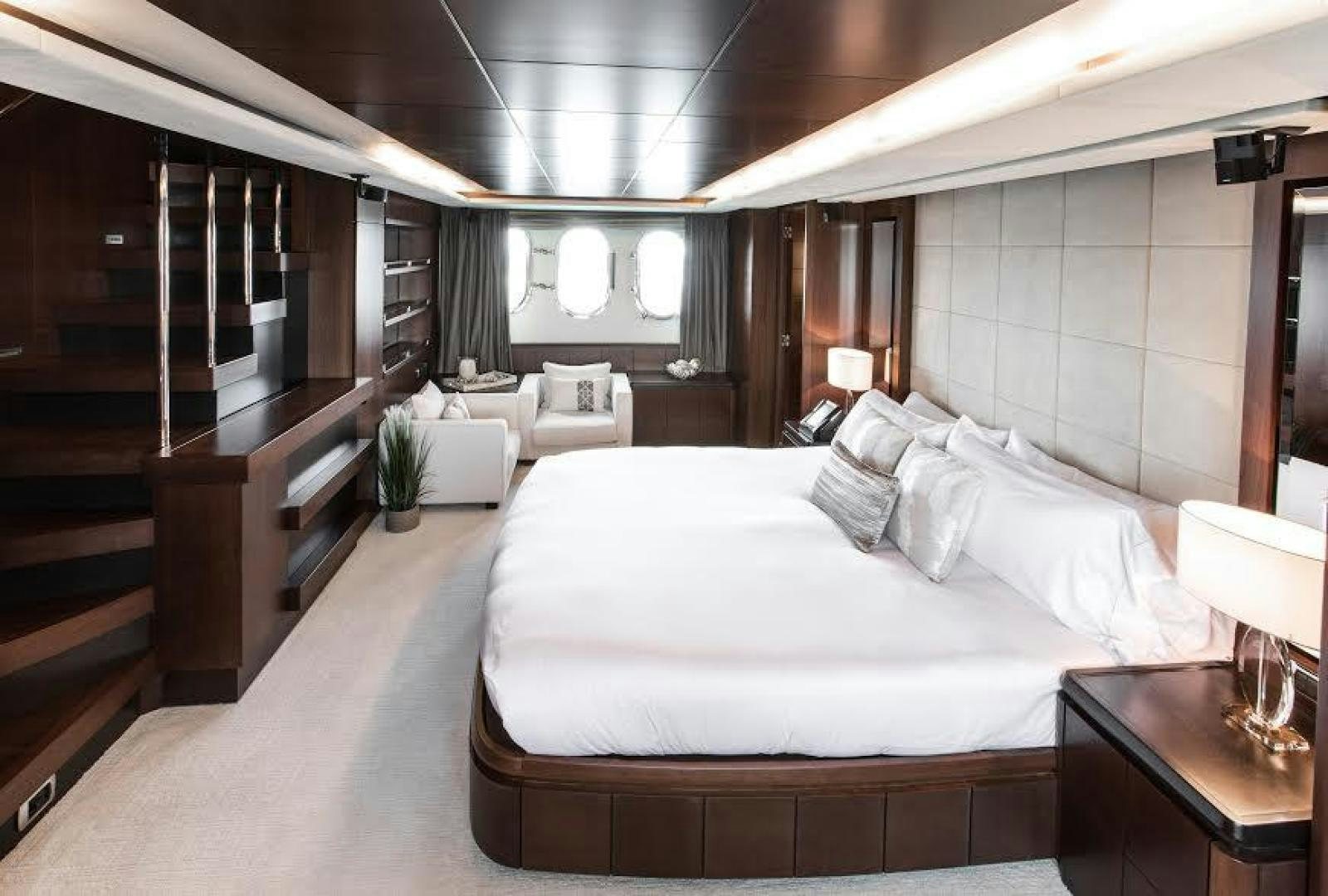 a large bedroom with a large bed aboard TAIL LIGHTS Yacht for Sale