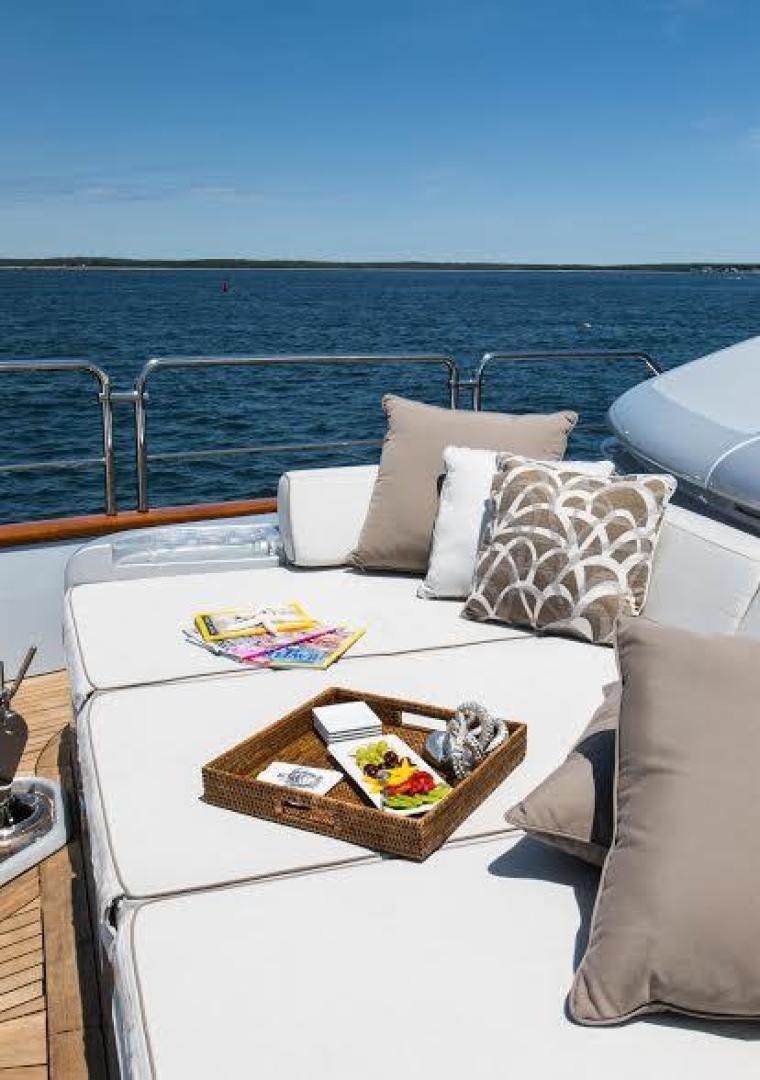 a table with a tray of food on it aboard TAIL LIGHTS Yacht for Sale