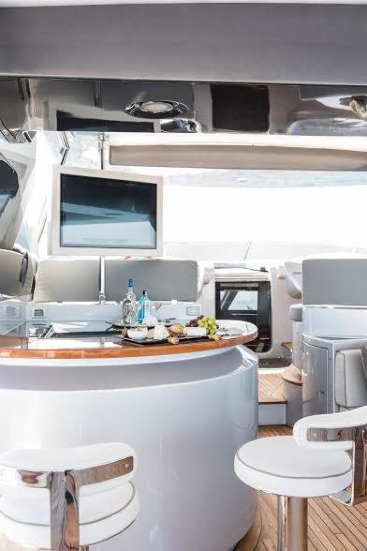 a kitchen with a tv on the wall aboard TAIL LIGHTS Yacht for Sale