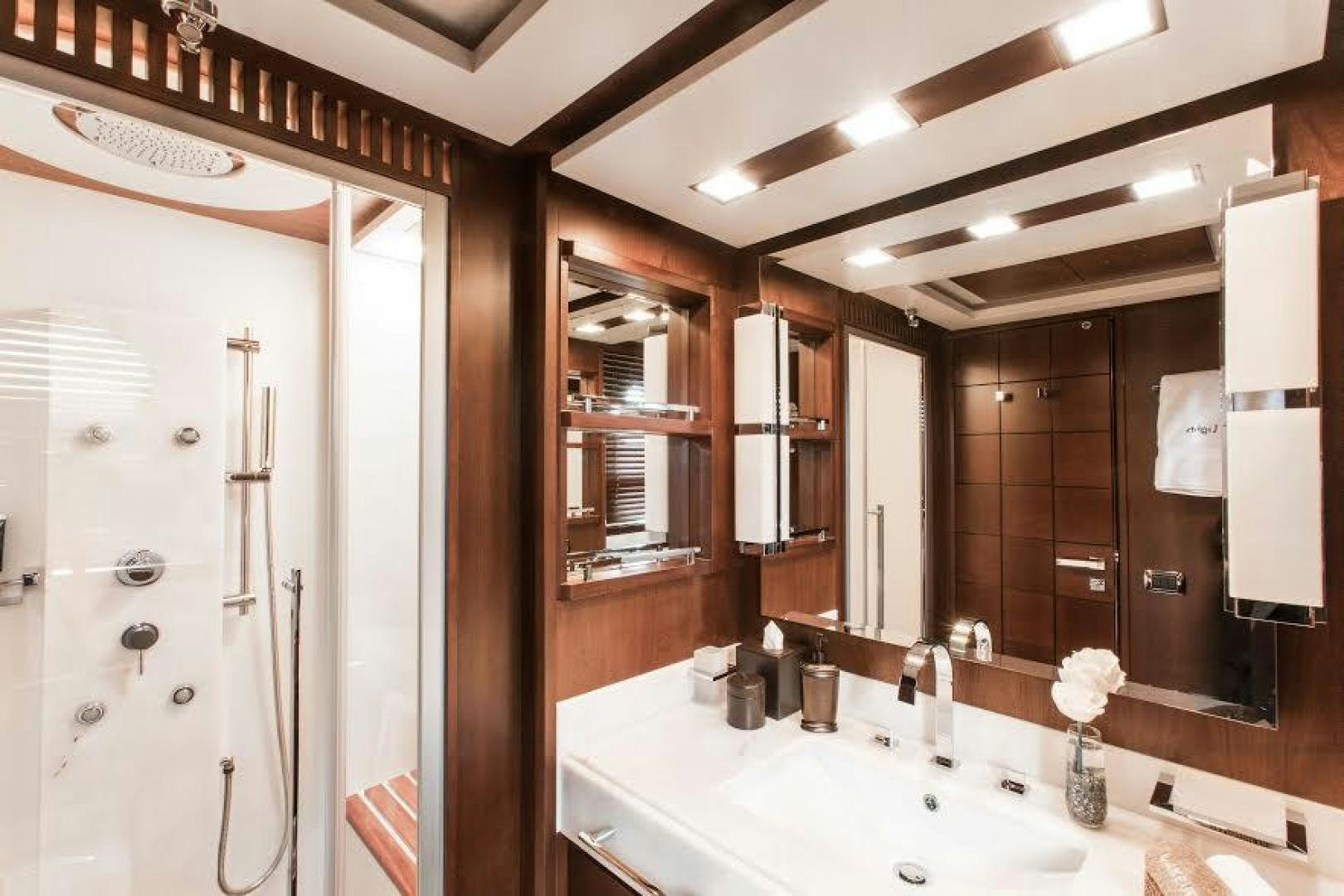 a bathroom with a large mirror aboard TAIL LIGHTS Yacht for Sale