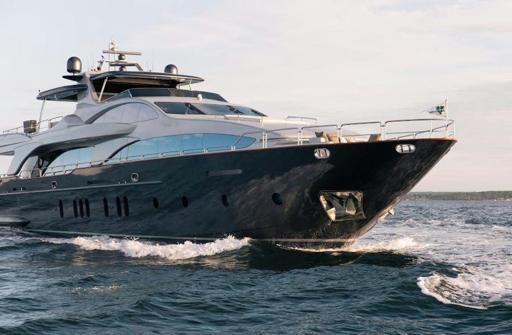 a large boat on the water aboard TAIL LIGHTS Yacht for Sale