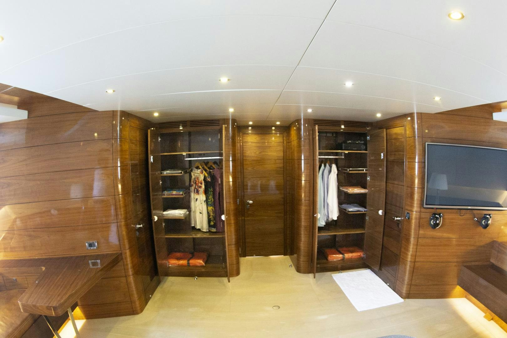 a room with a closet and a tv aboard MUSIC Yacht for Sale