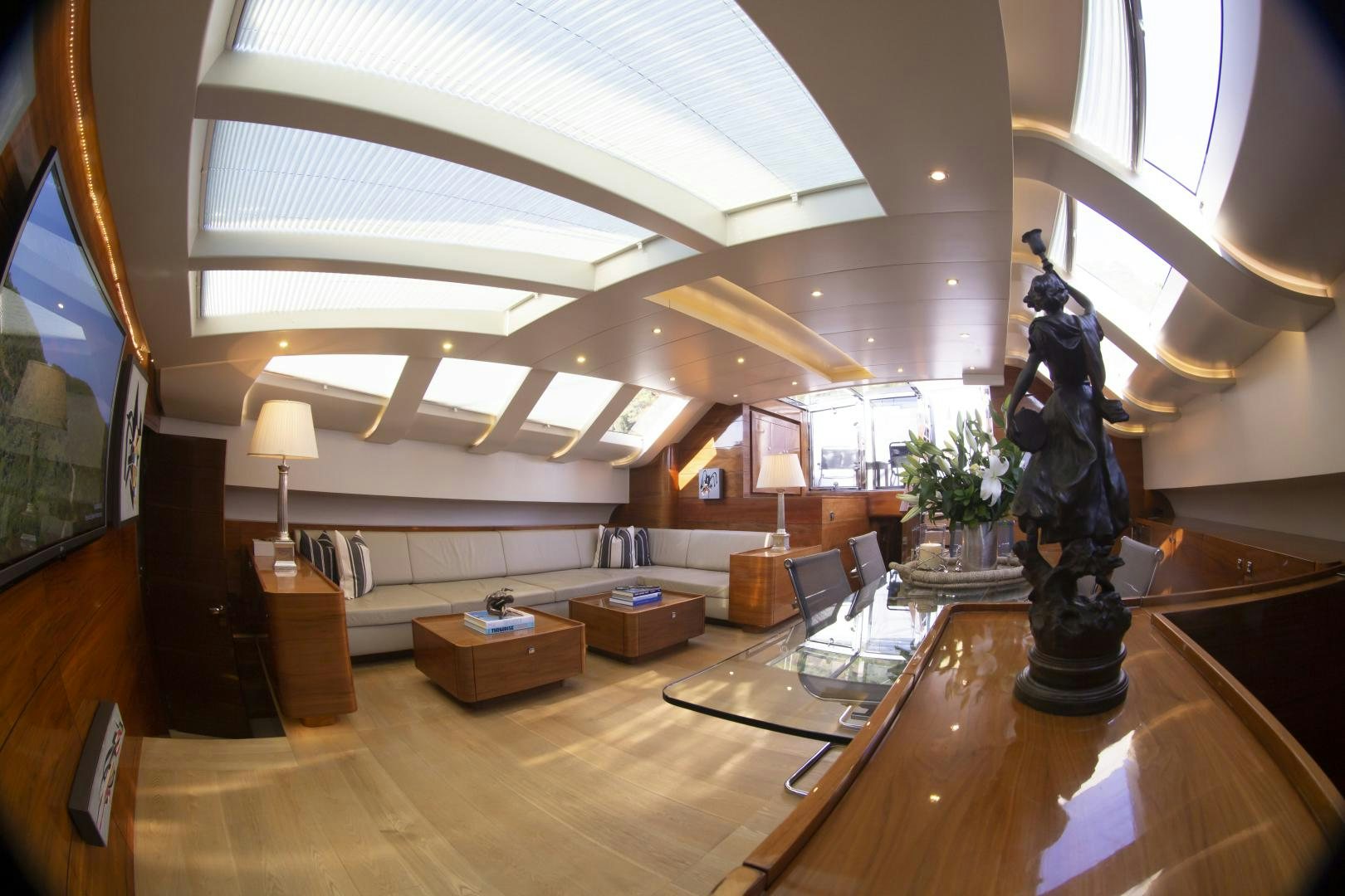 a room with statues and a large mirror aboard MUSIC Yacht for Sale