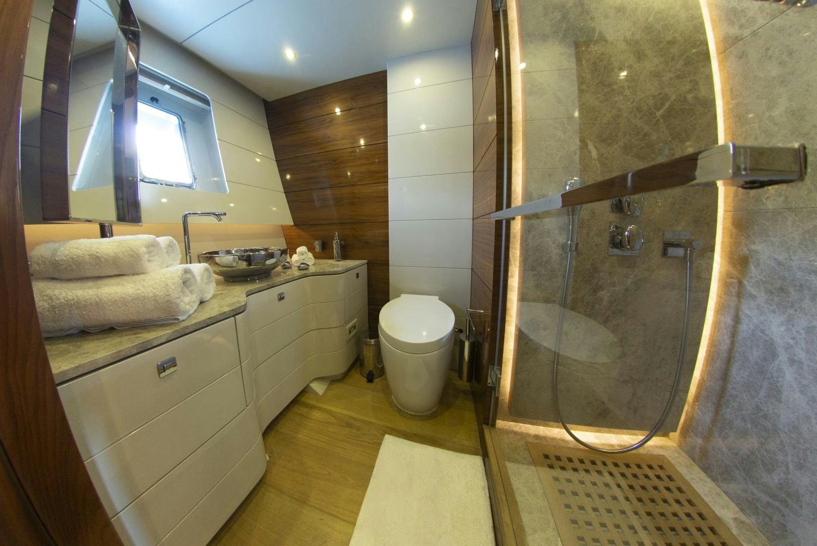 a bathroom with a glass shower aboard MUSIC Yacht for Charter