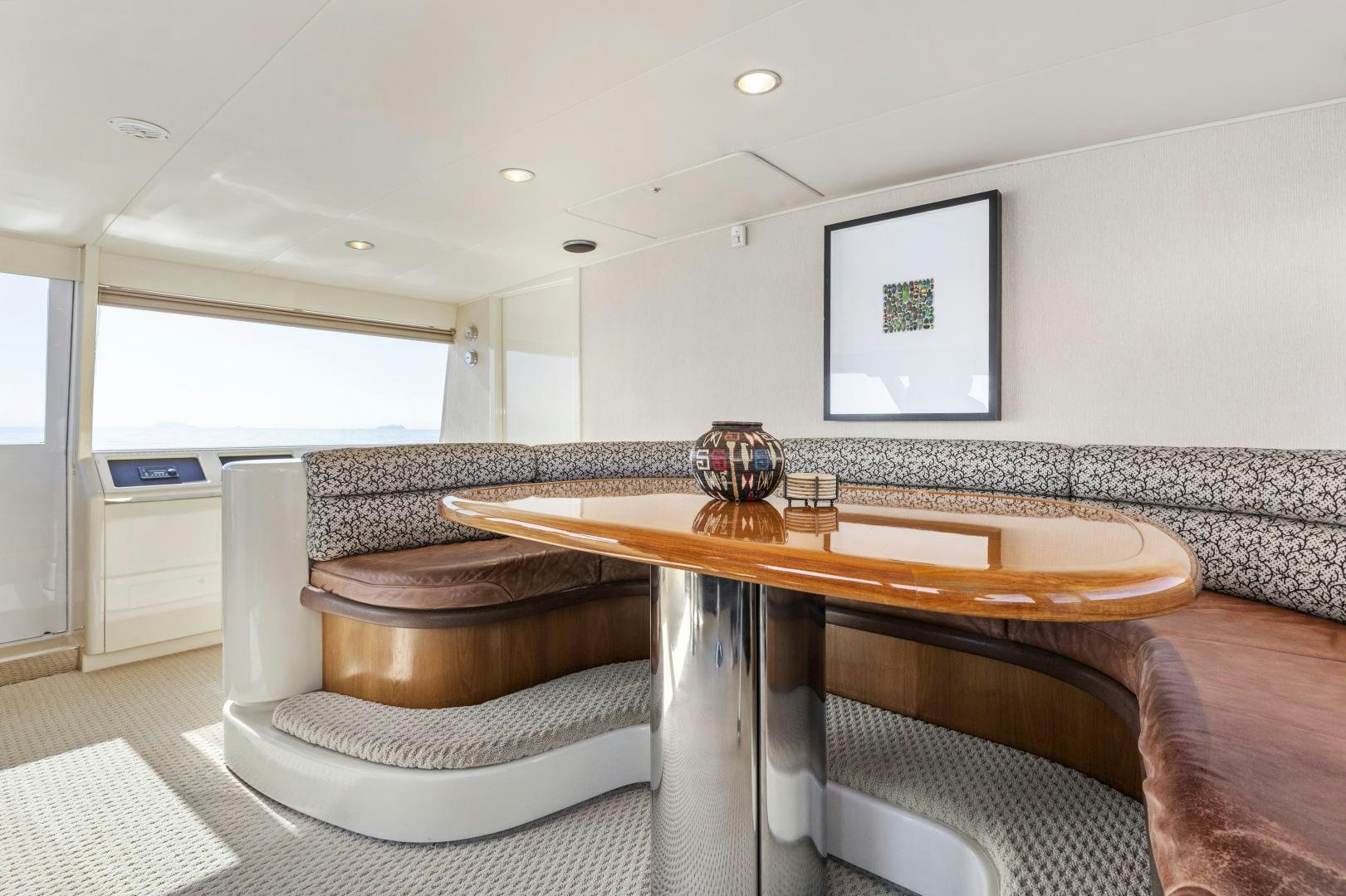 a large kitchen with a marble counter top aboard AQUILA Yacht for Sale